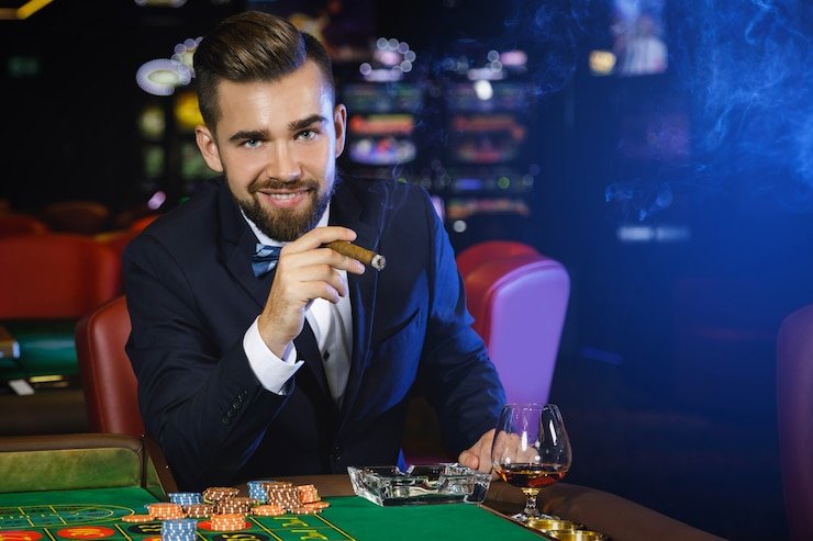 Aplikasi pasukan jitu menampilkan meja Baccarat langsung dengan dealer profesional di studio multi-kamera